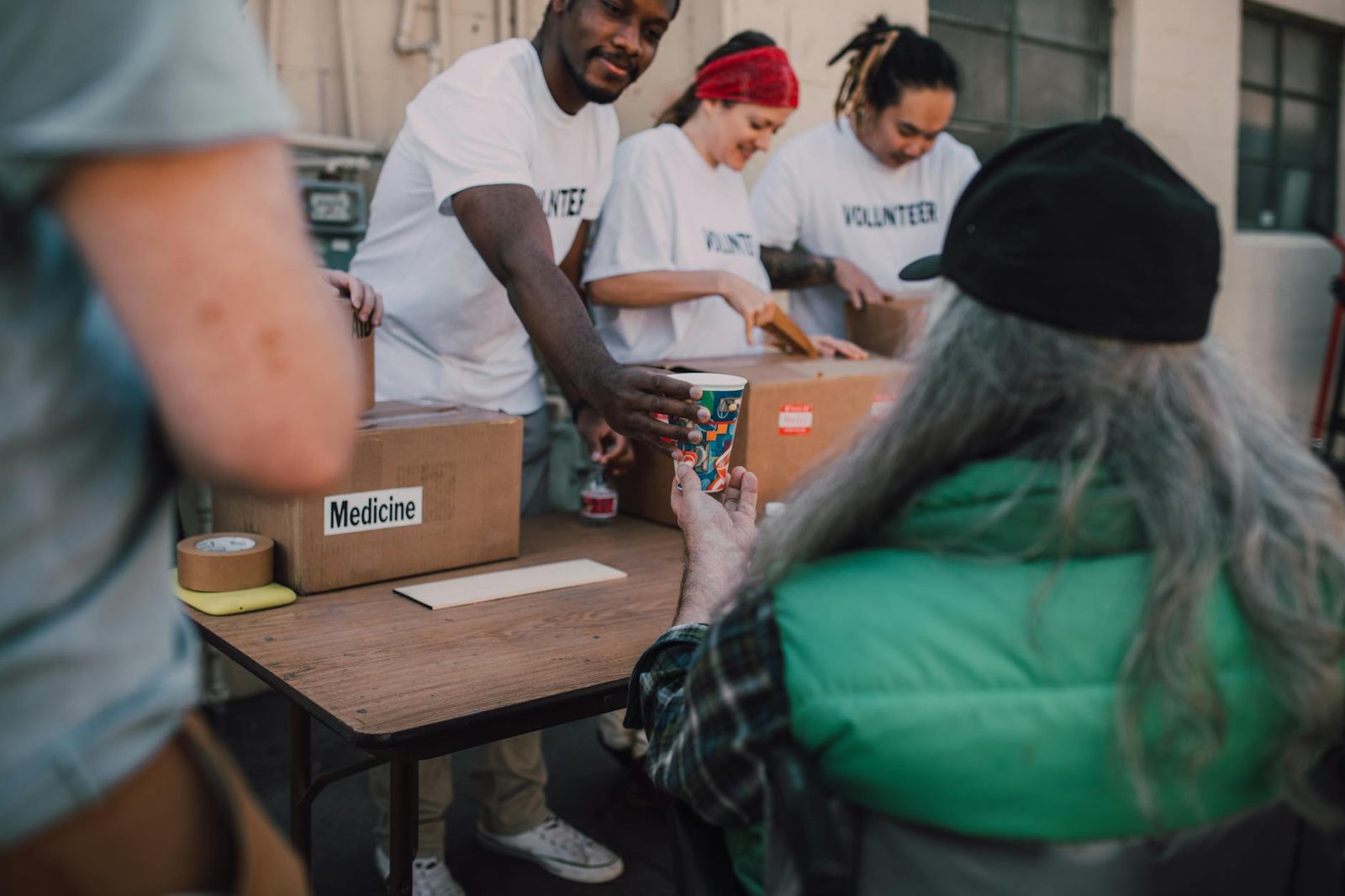 Volunteers handing out donations